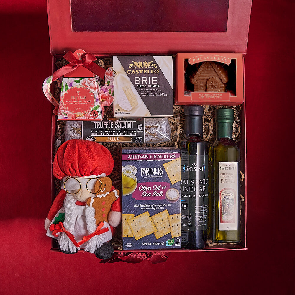 Red Window Gift Box Featuring Gourmet Snacks and Mrs. Claus Plush – how the gift is presented